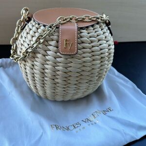 Francis Valentine Honeypot straw bag with gold chain strap.